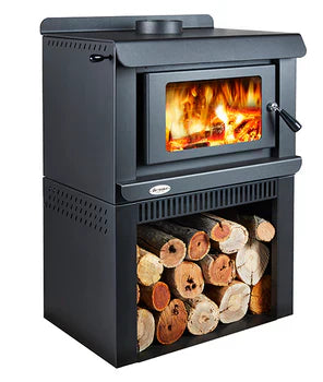 Australian made Jarrahdale freestanding wood heater with built-in log storage and visible fire through glass door.